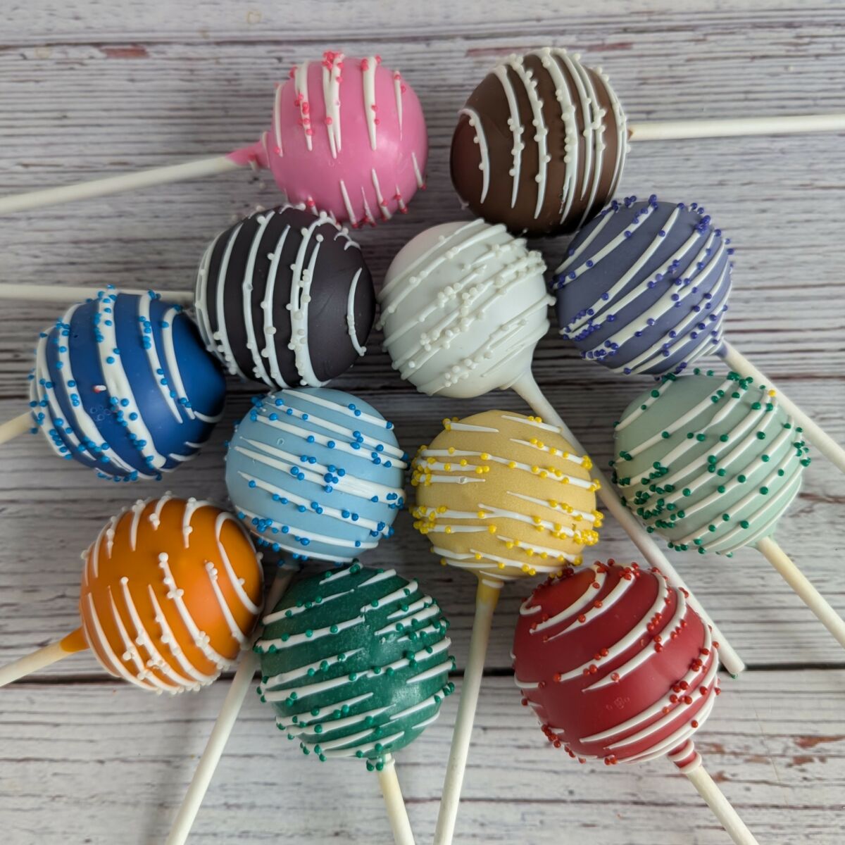 Simple Cake Pop with White Drizzle and Nonpareils